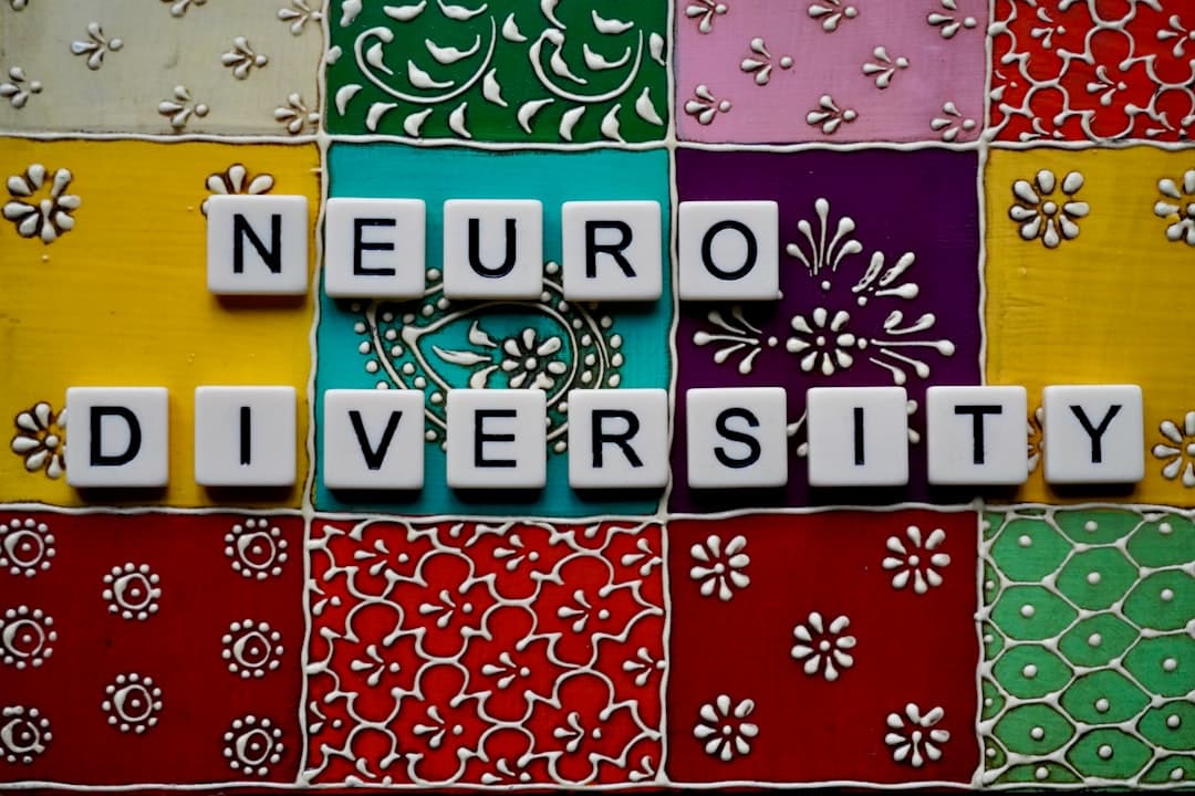 Why Your Brain Craves Cognitive Dissonance — the word neuro university spelled with scrabble tiles